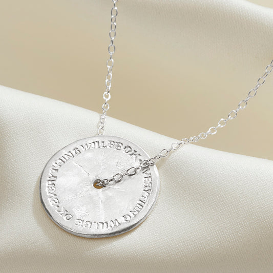 Anxiety relief necklace in silver with spinning disc pendant hand engraved with the words Everything Will Be OK on repeat.