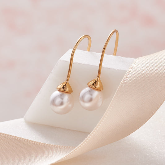 Long drop white pearl earrings
