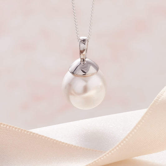 Large white pearl pendant in silver on a sterling silver chain