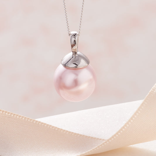 Rose pink pearl pendant in sterling silver on a sterling silver chain