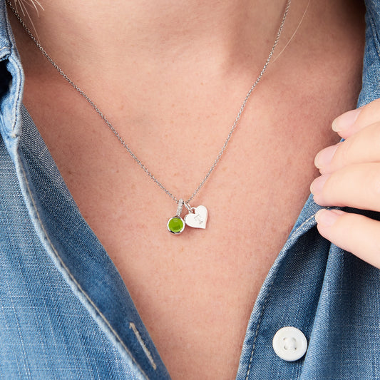 Personalised peridot birthstone necklace with diamonds and heart initial charm in silver