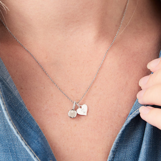 Personalised rock crystal birthstone pendant in silver with diamonds and sterling silver initial heart charm