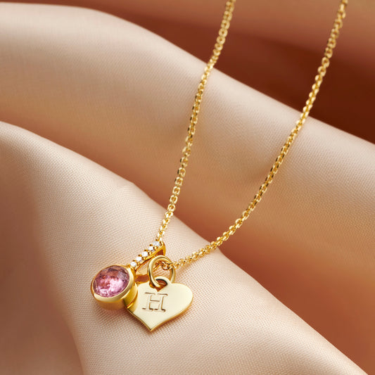Personalised Pink Tourmaline birthstone necklace in gold vermeil with diamonds and heart initial charm