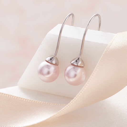 Pale pink Pearl drop earrings in sterling silver on long silver ear hooks
