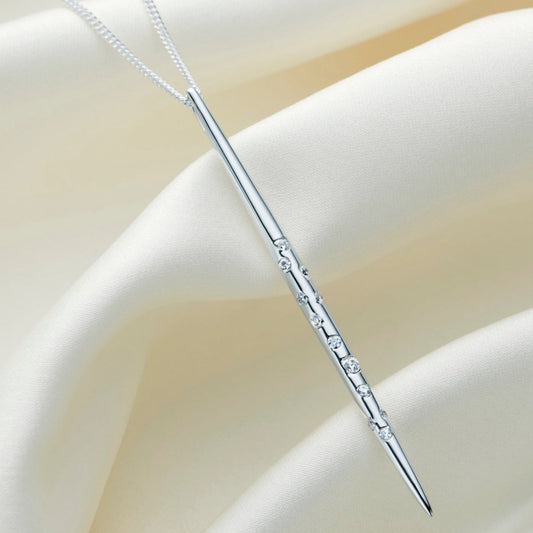 Sterling silver spike pendant set with crystals in the pattern of the Taurus star sign constellation by Claudette Worters