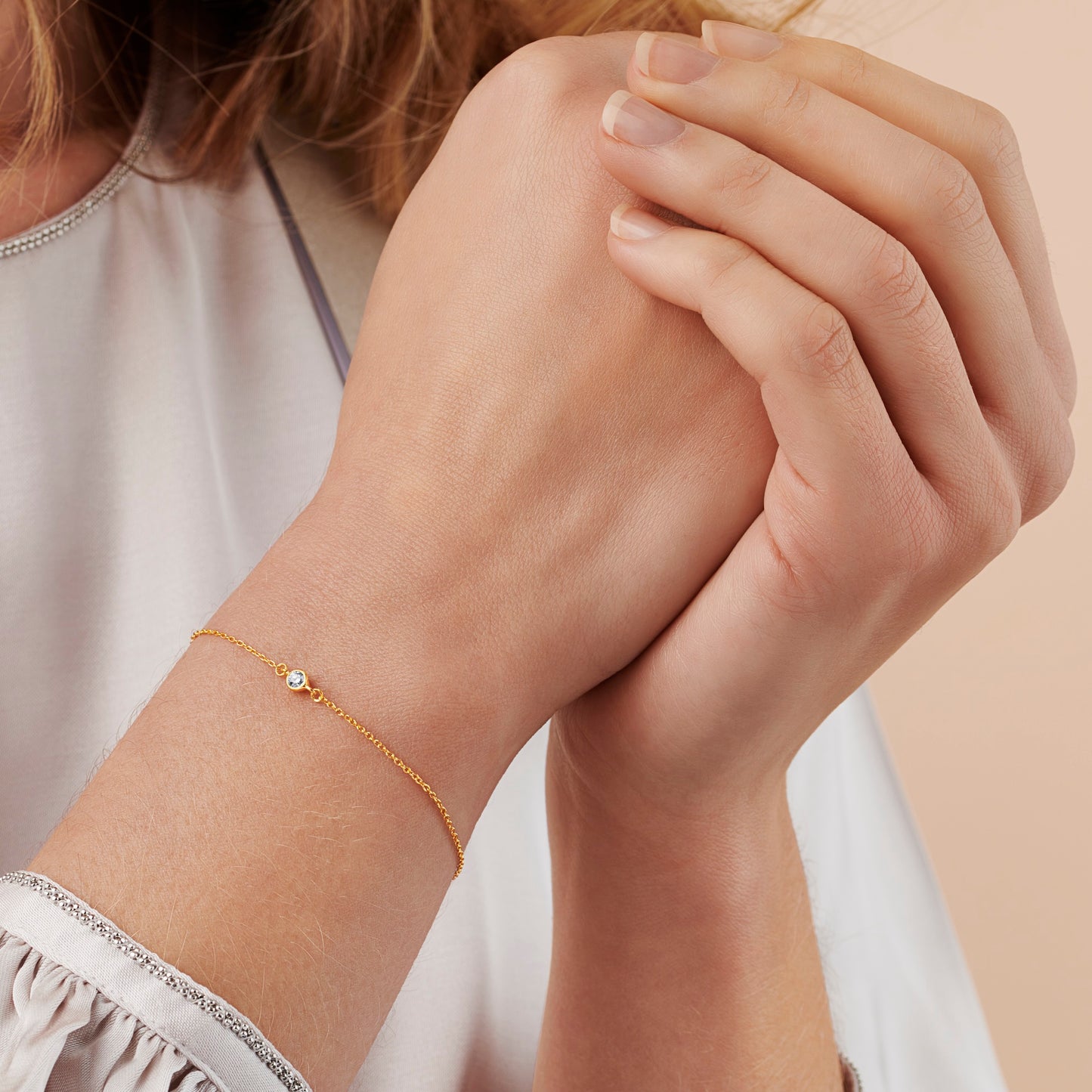 21st birthday diamond bracelet in gold with one solitaire diamond in a rub over setting