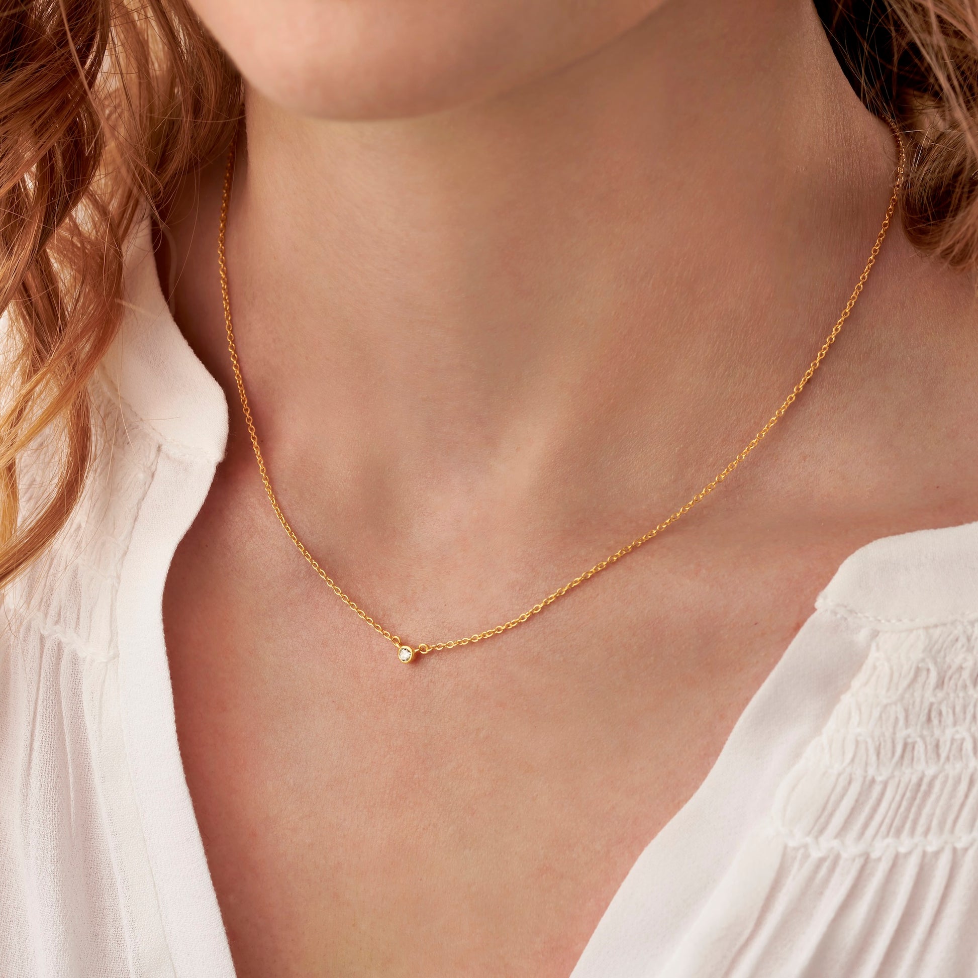 21st birthday diamond necklace with single white diamond on a fine 18 carat gold vermeil trace chain