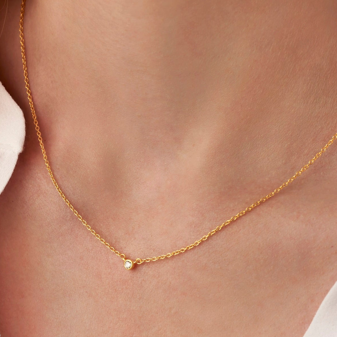 Single solitaire diamond necklace 0.06 carats in gold vermeil on a dainty chain