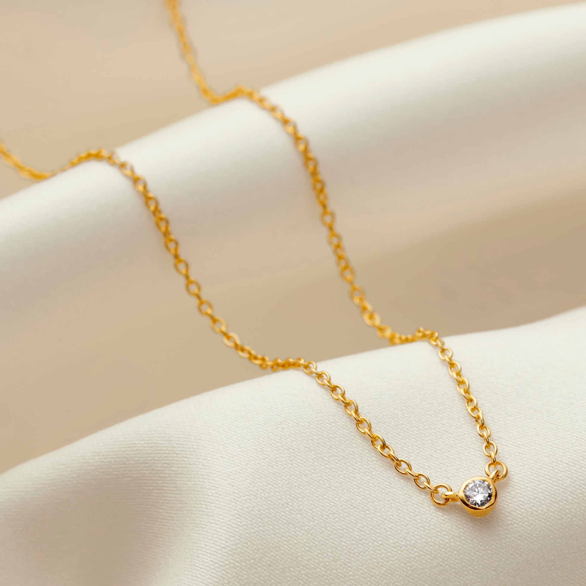 21st birthday necklace with 1 solitaire diamond in gold vermeil on a fine trace chain