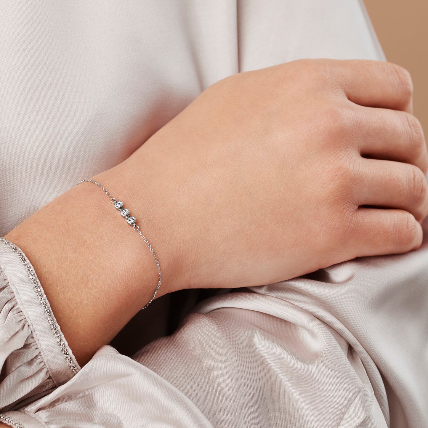 Three diamonds for three decades bracelet for 30th birthday in sterling silver by Claudette Worters
