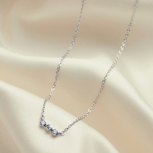30th birthday diamond necklace with three round diamonds in sterling silver