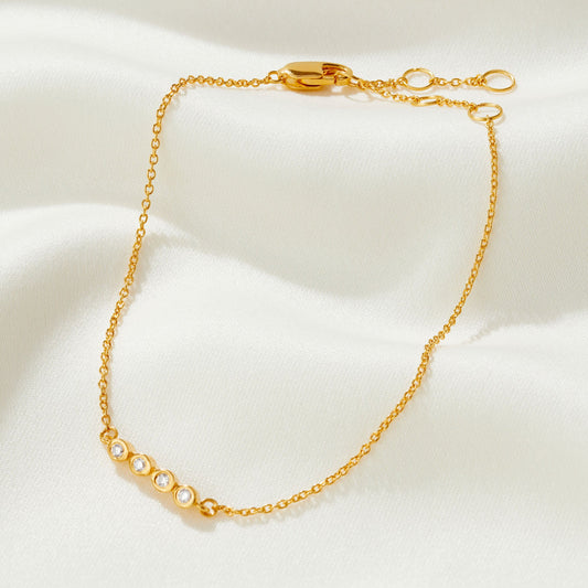 40th birthday diamond bracelet in gold with 4 diamonds for each decade