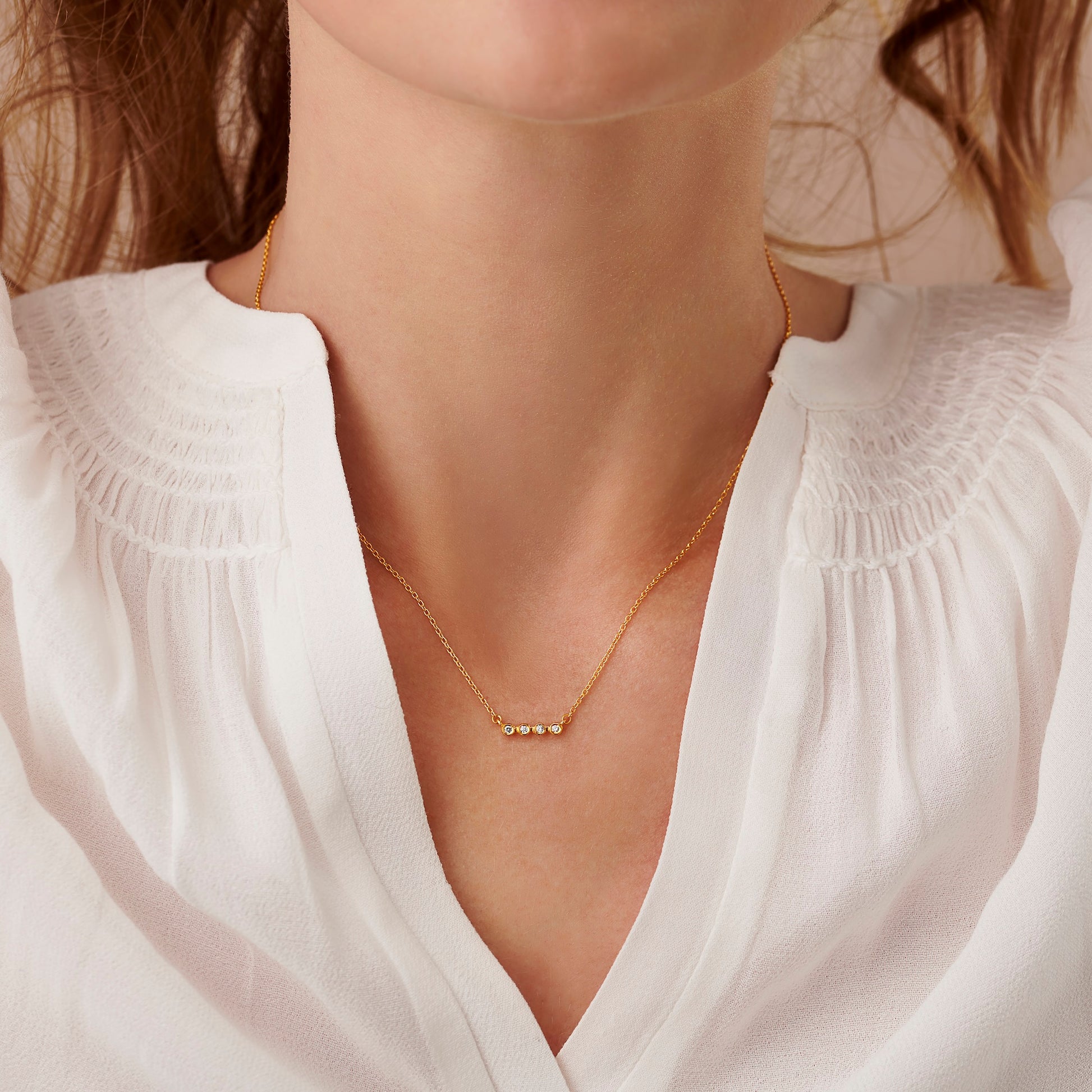 40th birthday four diamond necklace in gold vermeil on a fine gold chain