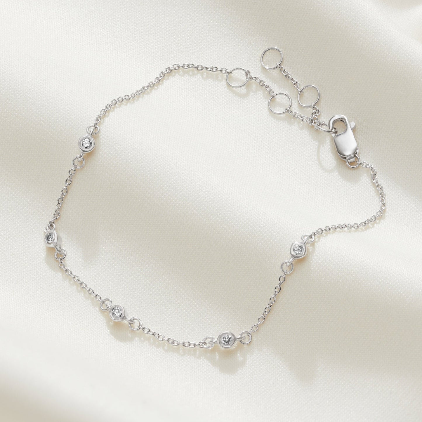 50th birthday diamond bracelet with 5 diamonds to represent each decade in sterling silver 