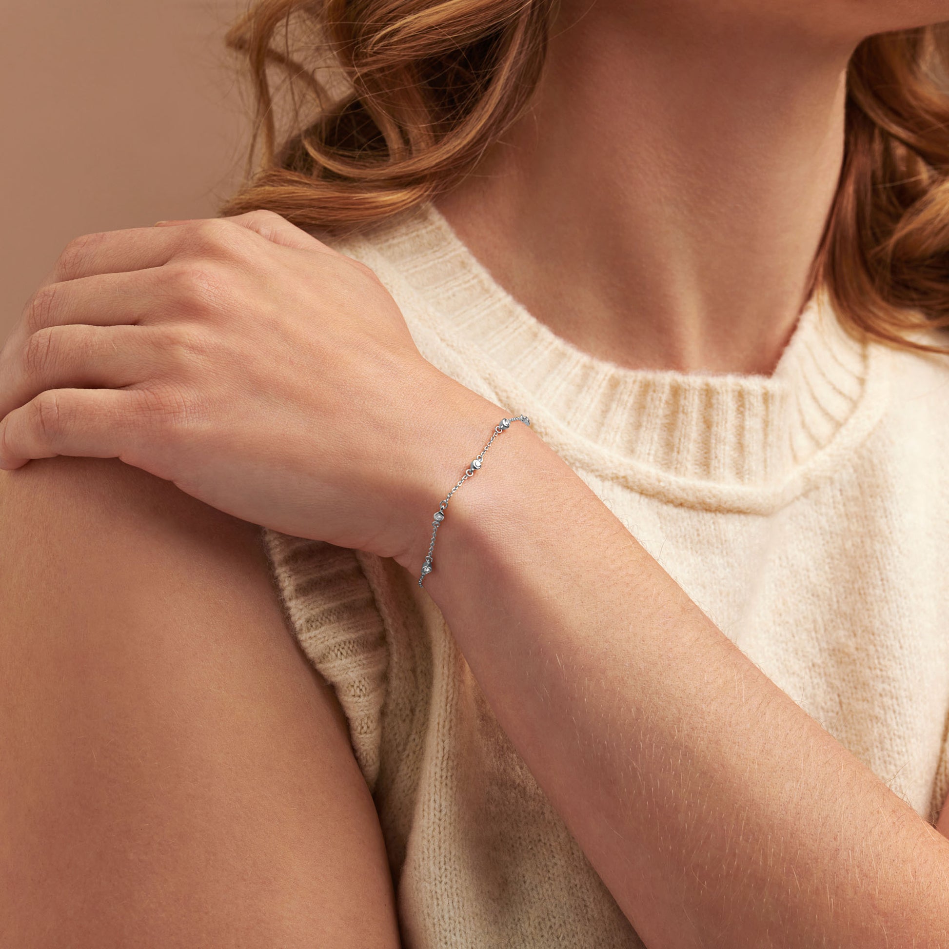 Dainty 50th birthday diamond bracelet in silver with five white diamonds