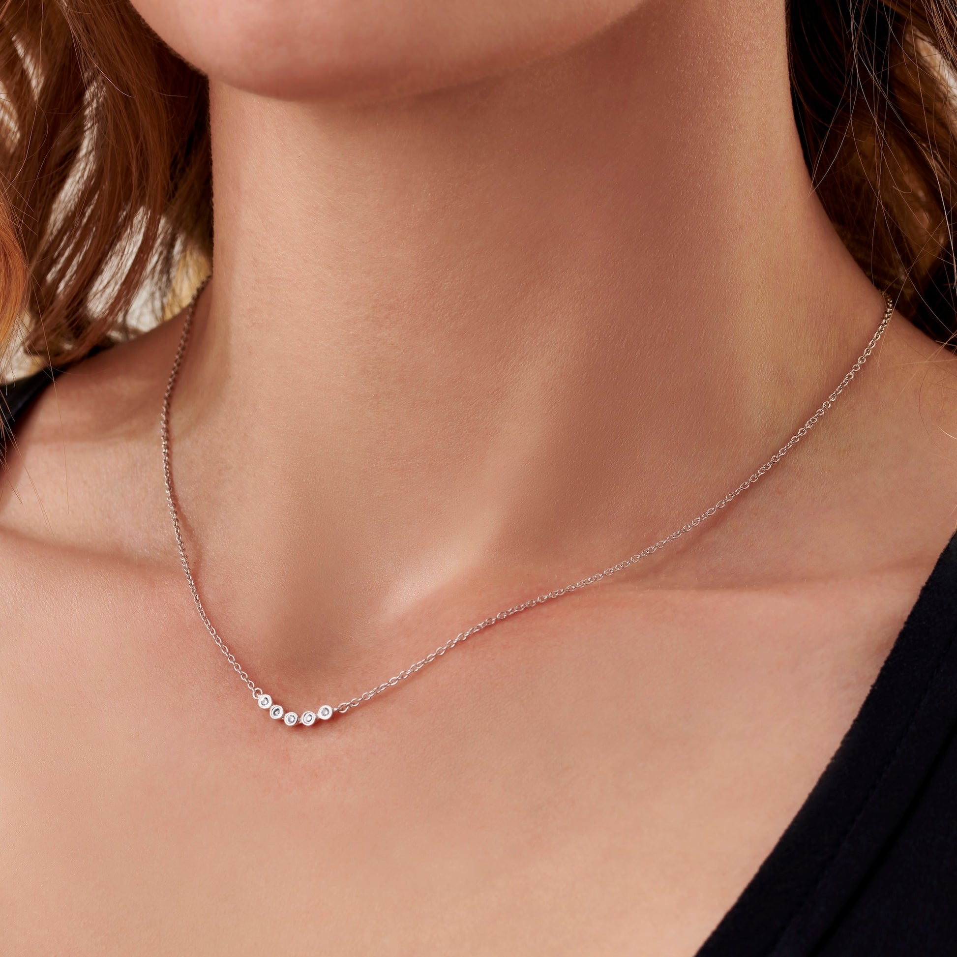 50th birthday necklace with 5 small round diamonds on a delicate sterling silver trace chain