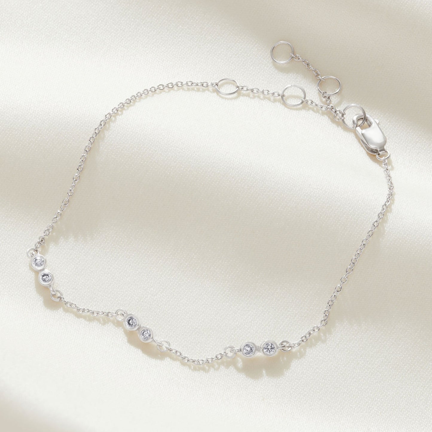 60th birthday diamond bracelet.  6 diamonds to represent 6 decades in sterling silver 
