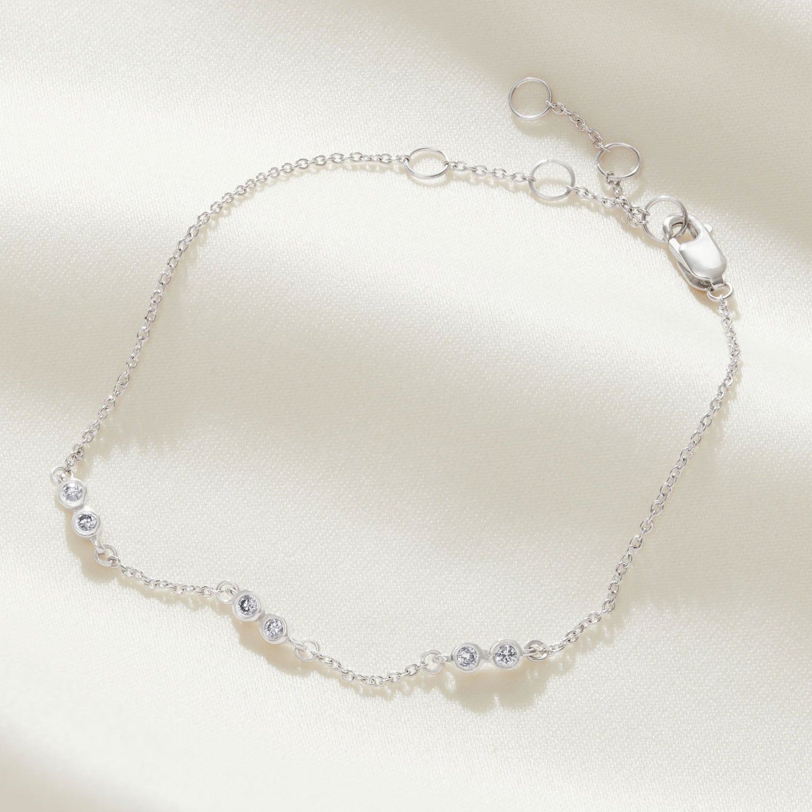 60th birthday diamond bracelet.  6 diamonds to represent 6 decades in sterling silver 