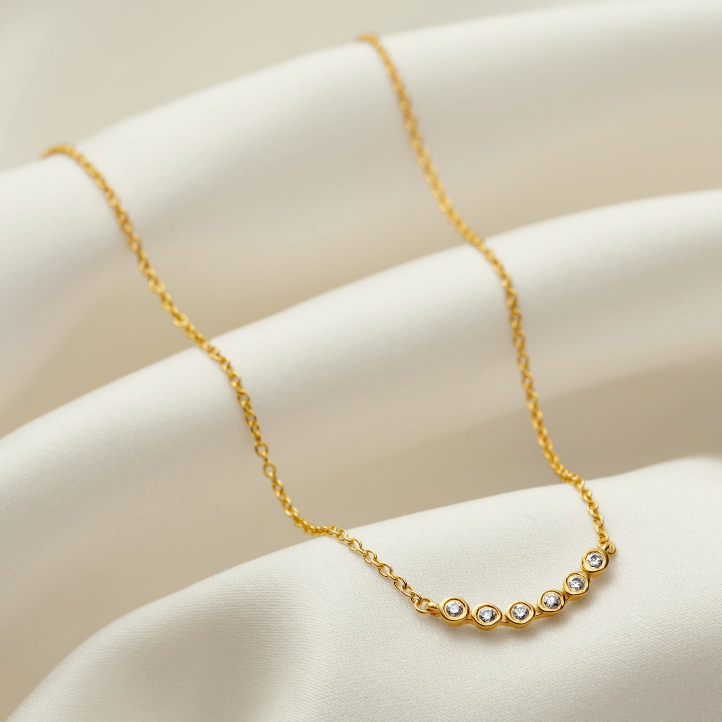 60th birthday diamond necklace in gold vermeil with six diamonds by Claudette Worters