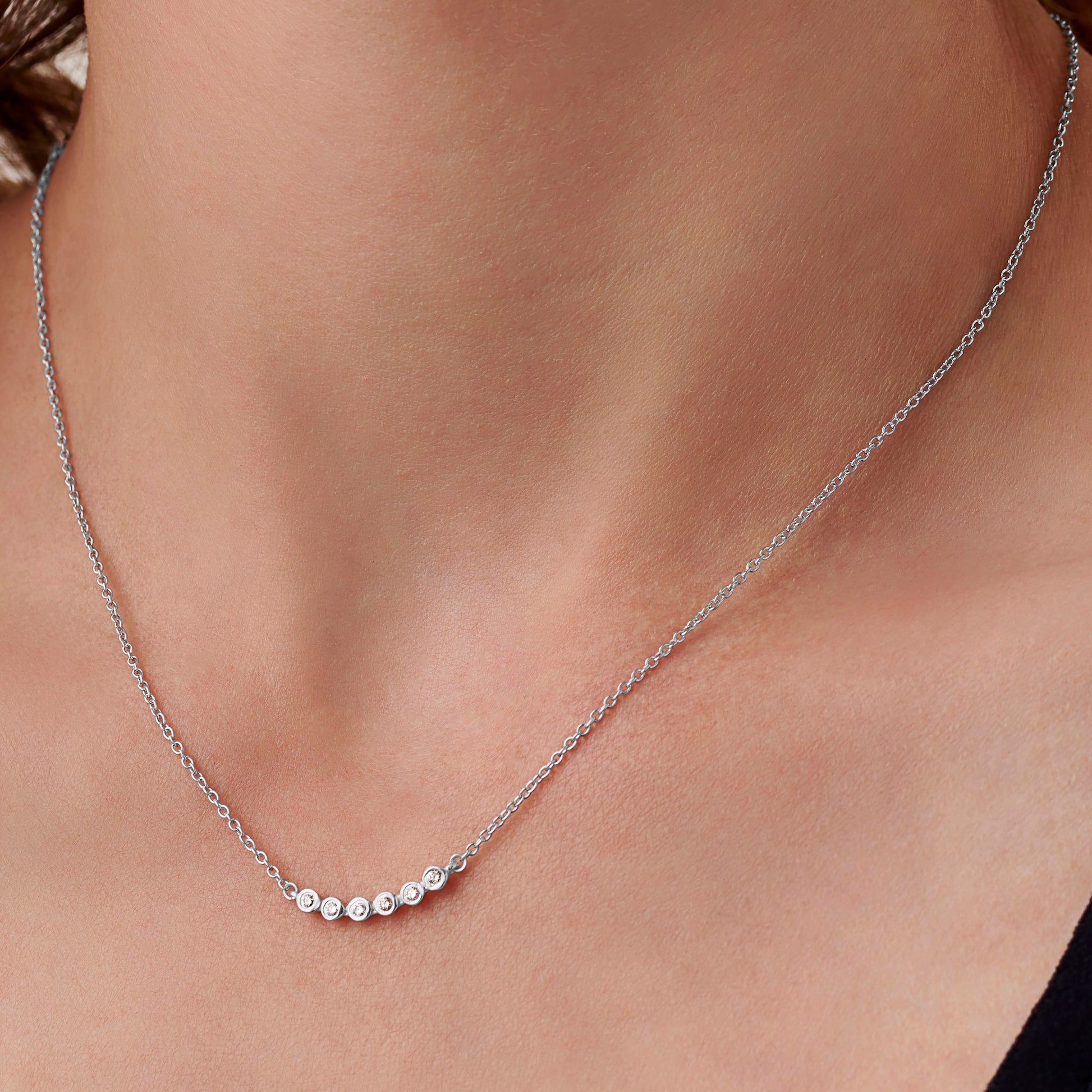 Six decades necklace for 60th birthday with six diamonds on a delicate sterling silver chain by Claudette Worters