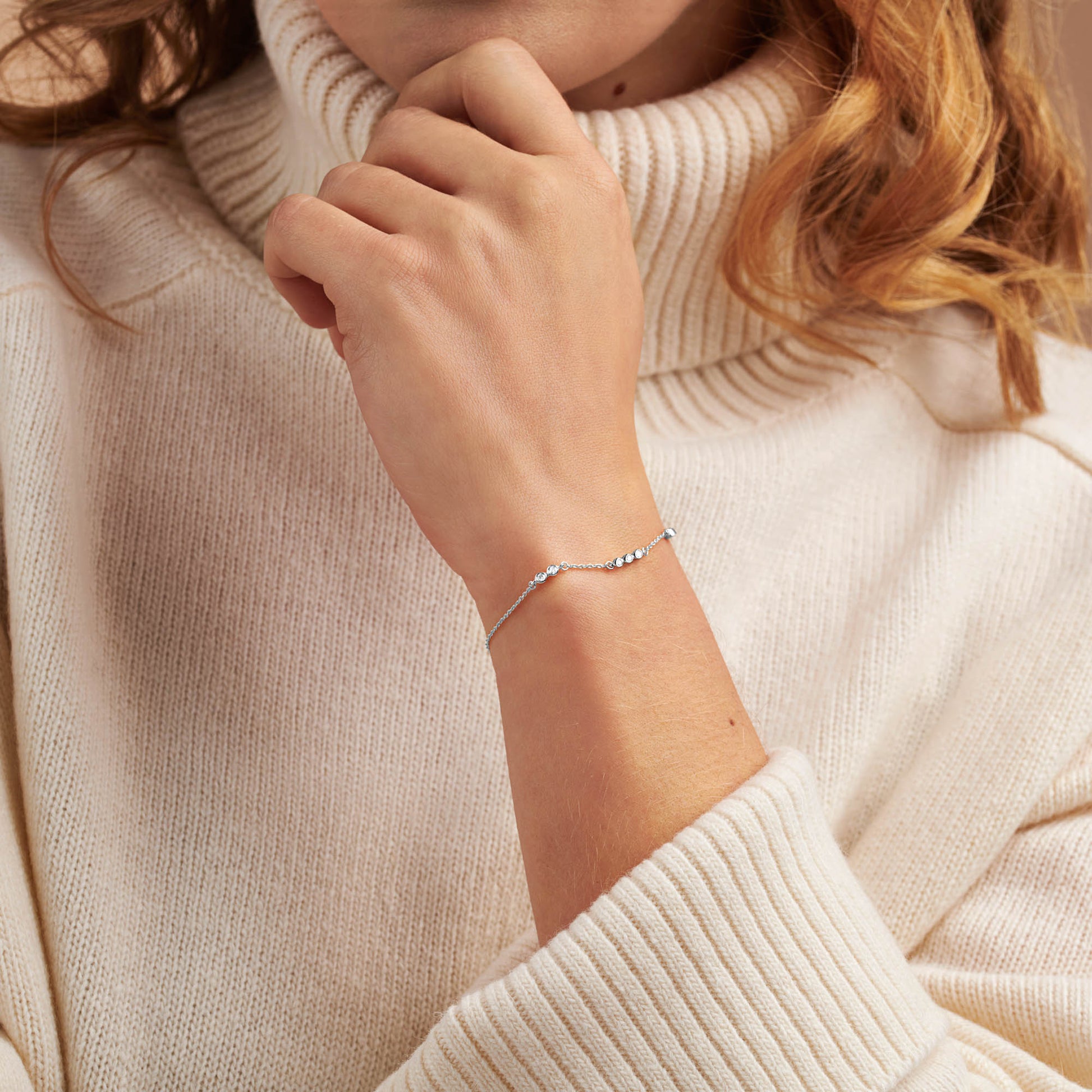 Diamond bracelet for 70th birthday featuring 7 diamonds for each decade in sterling silver
