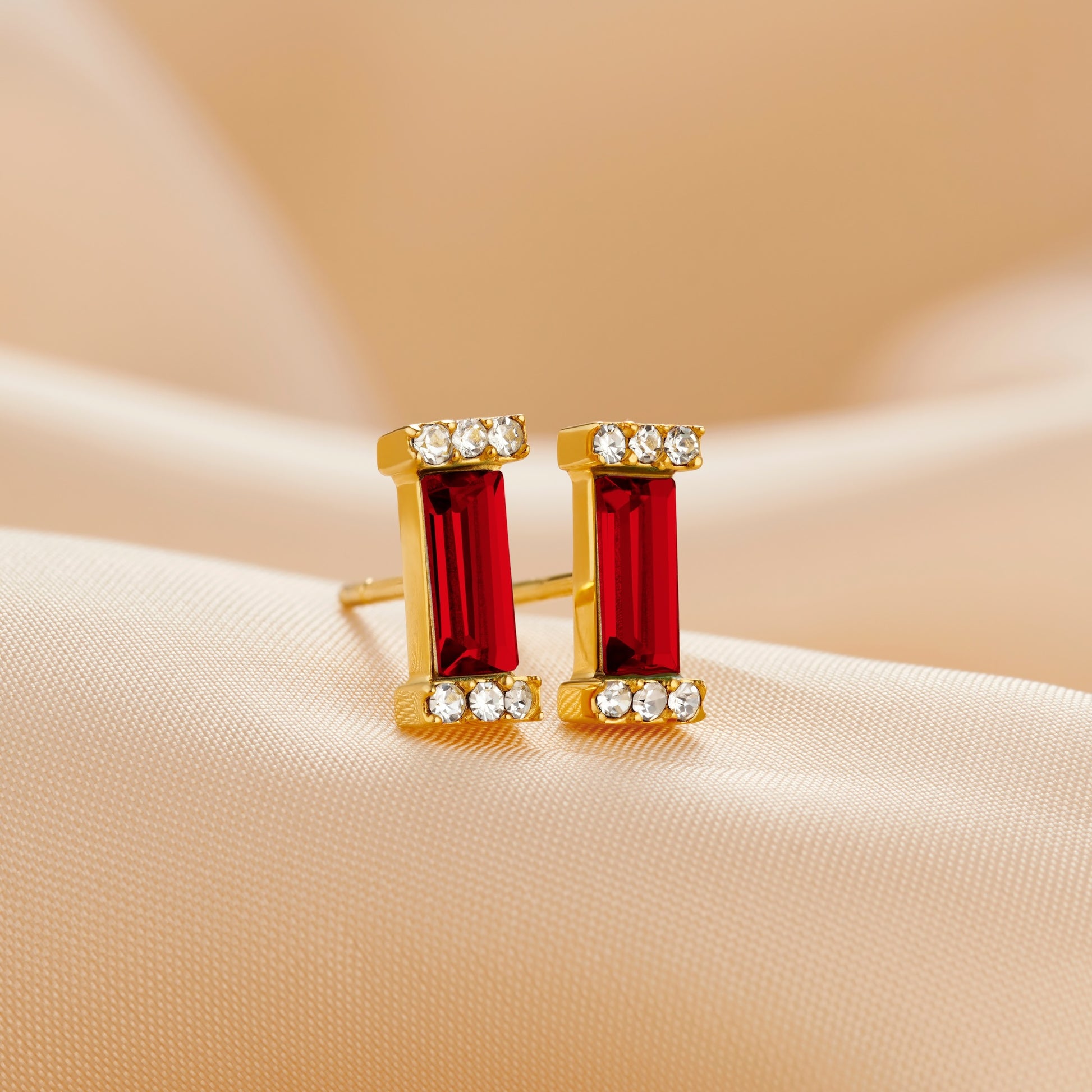 Garnet baguette cut crystal stud earrings in gold vermeil with gold posts by Claudette Worters