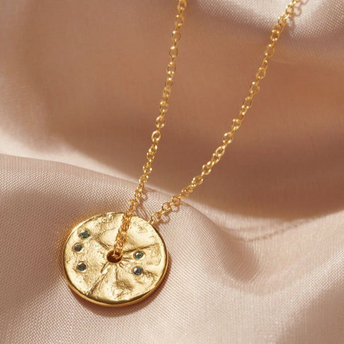 Alexandrite birthstone disc spinner necklace in gold vermeil set with pretty faceted  alexandrite gemstones by Claudette Worters.