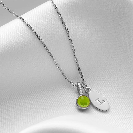 Peridot birthstone pendant with diamonds and personalised oval initial charm in sterling silver
