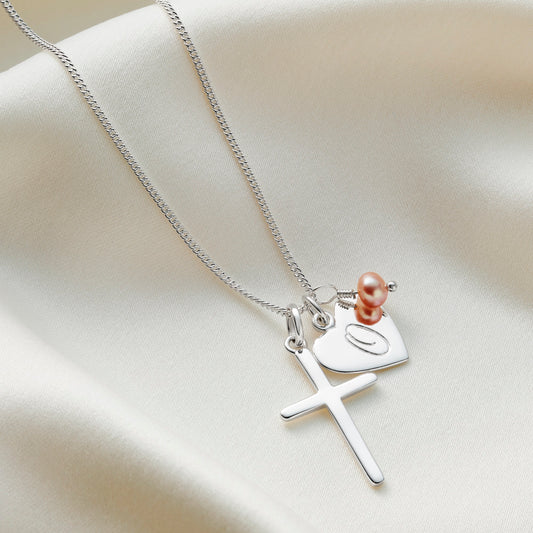 Cross necklace in sterling silver with personalised heart initial charm and birthstone