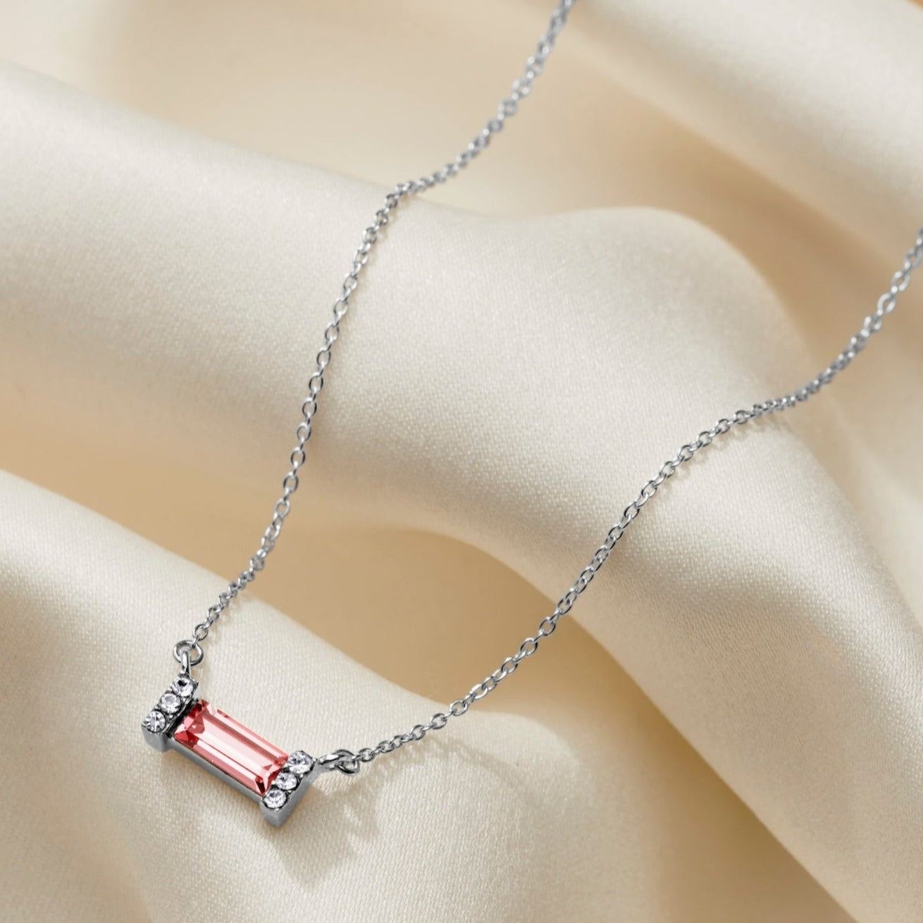 Pink Tourmaline necklace with a pink baguette shaped Swarovski crystal in a silver pavé crystal setting on a dainty sterling silver trace chain.  