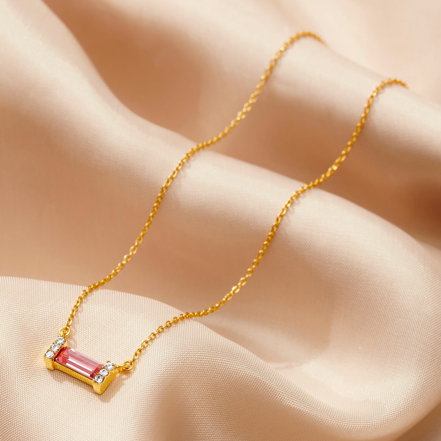 Pink tourmaline baguette birthstone necklace in gold with gold chain