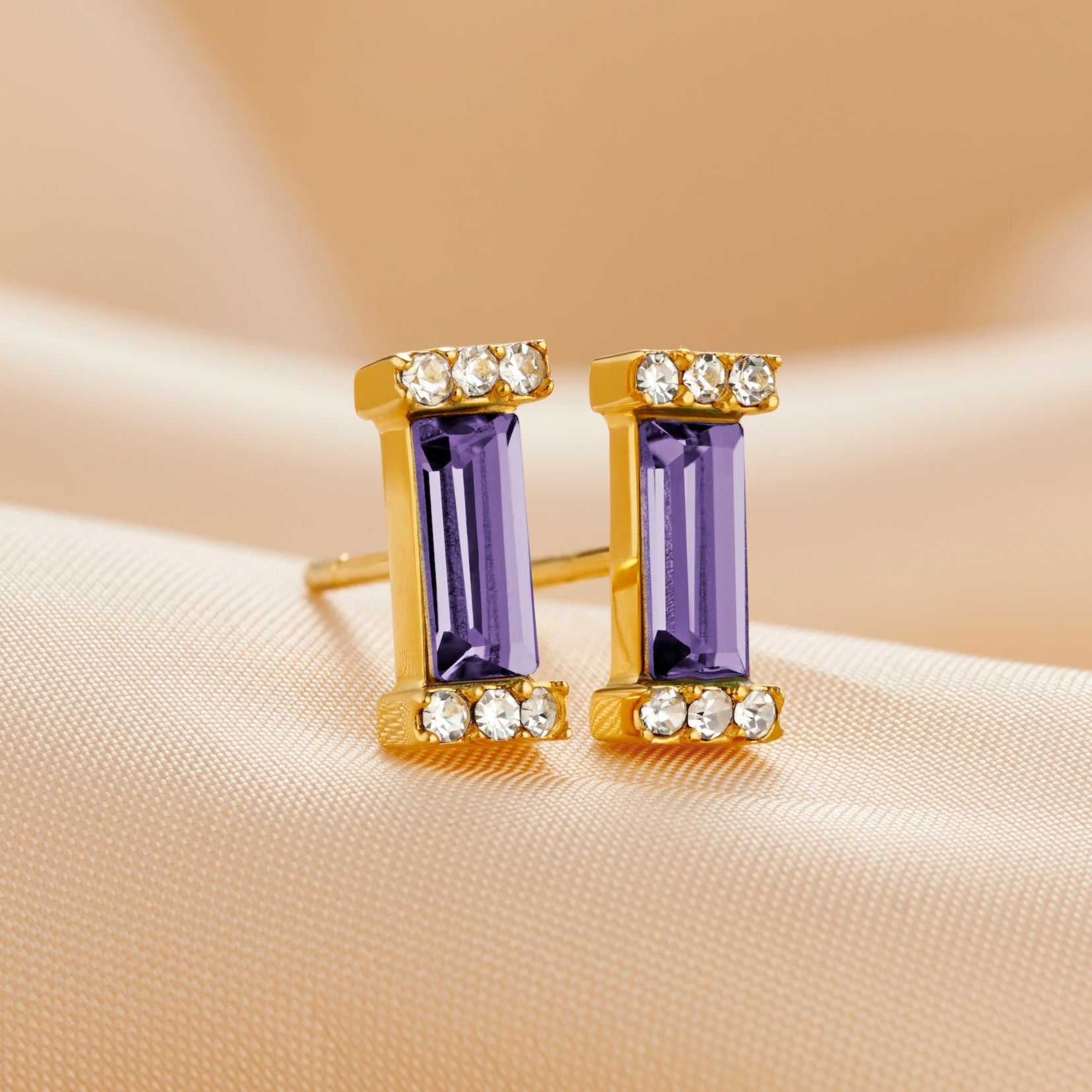 December birthstone stud earrings with baguette Tanzanite in gold vermeil.