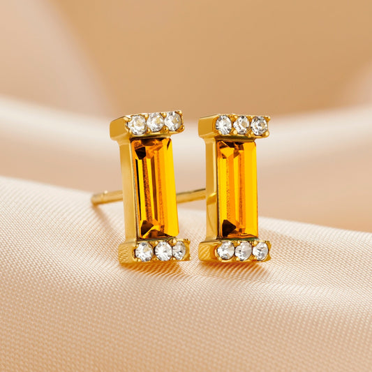 Topaz baguette cut crystal earrings in gold vermeil