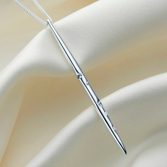 Silver spike pendant with the zodiac constellation of Cancer depicted in little white Swarovski crystals on a fine sterling silver chain.