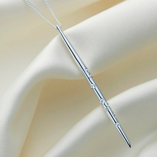Silver spike pendant set with crystals set in the star constellation of the Aquarius star sign